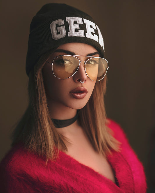 woman wearing black and white knit hat
