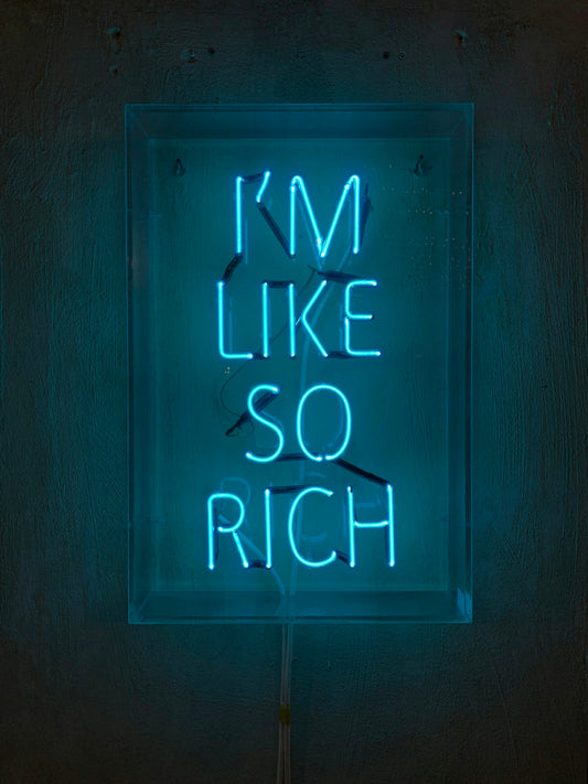 a neon sign that says i'm like so rich