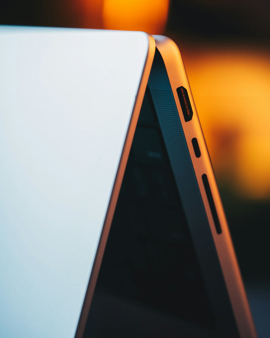 a close up of a laptop computer with a blurry background
