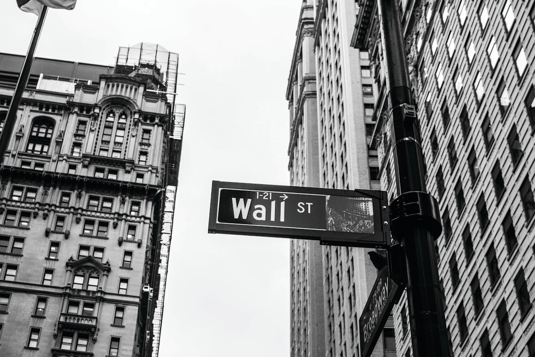 grayscale photo of 1-21 Wall street signage