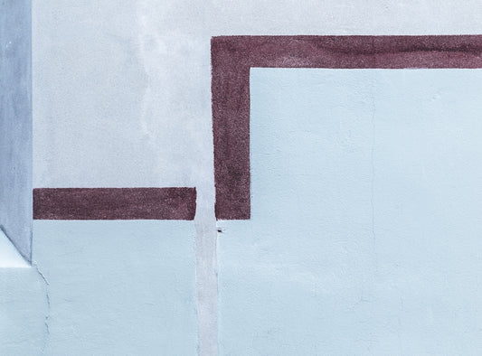 a painting of a white wall with a red border