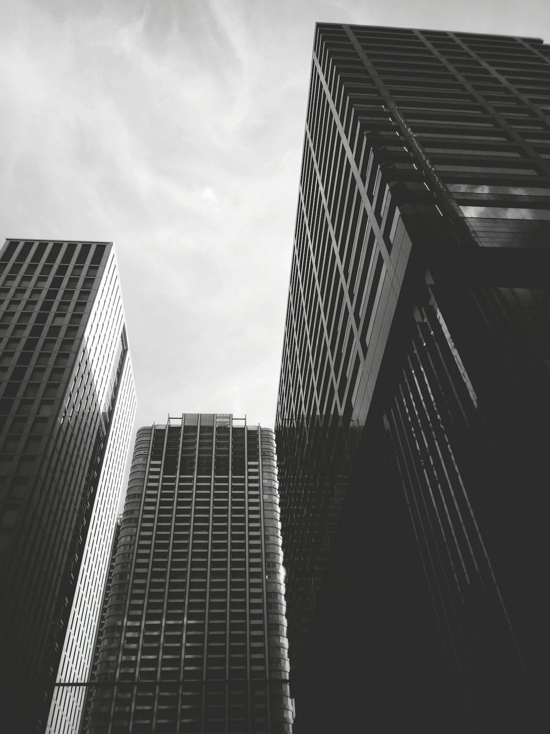 grayscale photo of high rise building