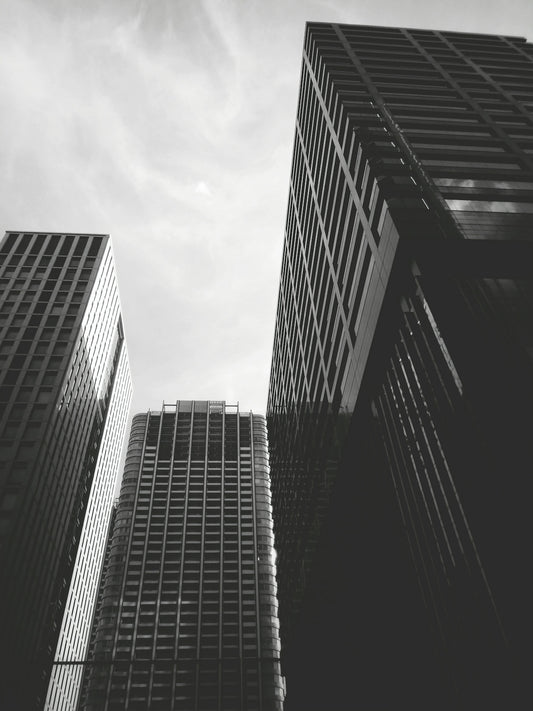 grayscale photo of high rise building