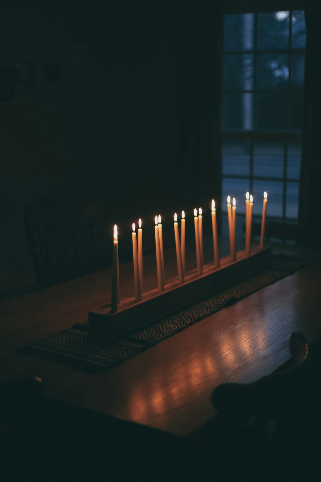 candles on brown wooden table