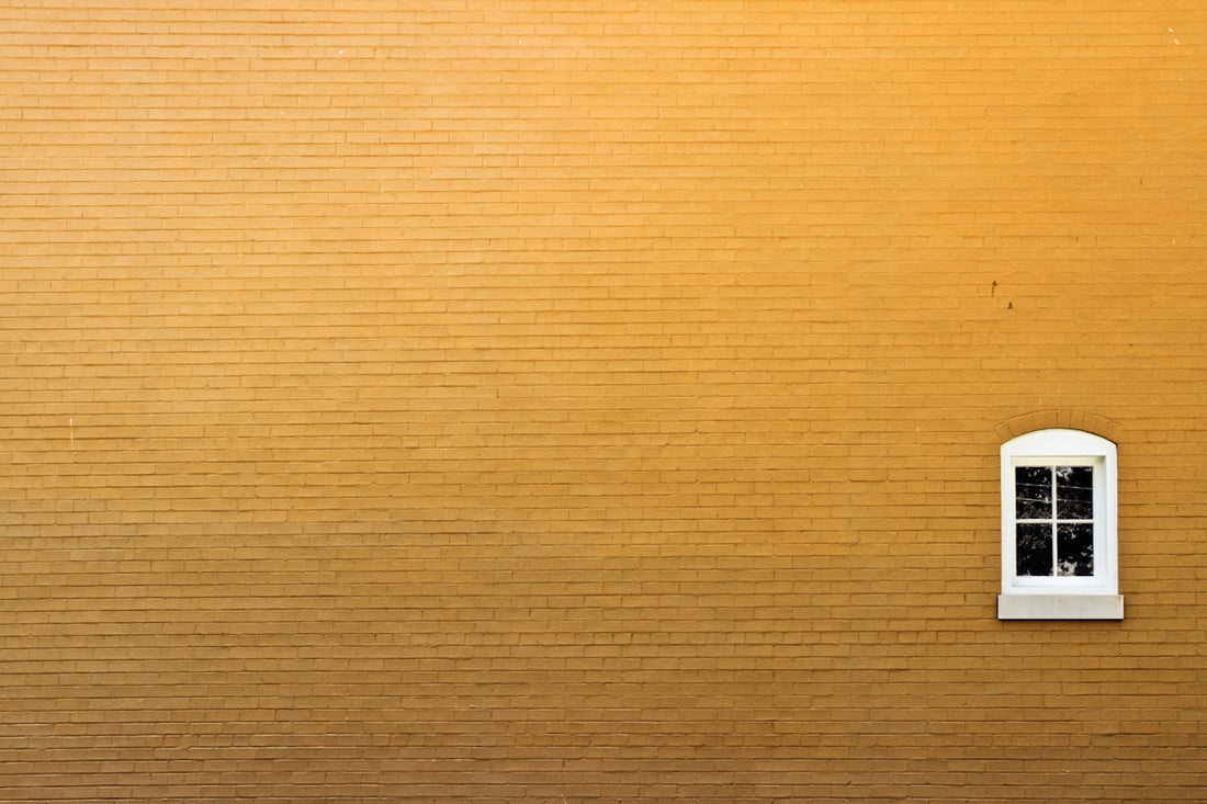 brown wooden board with white paper