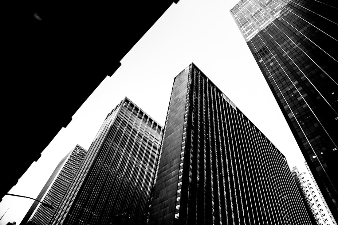 grayscale photo of high rise buildings