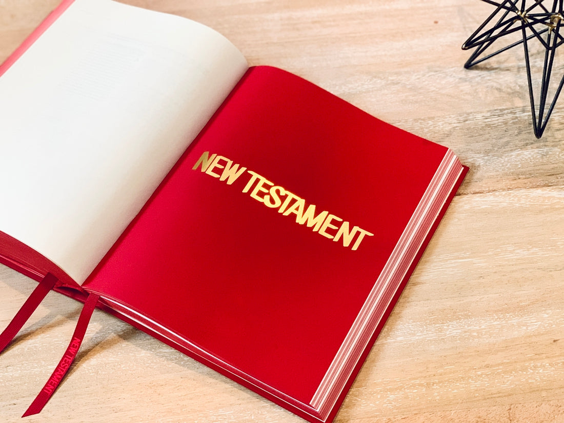 red book on brown wooden table