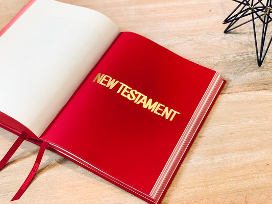 red book on brown wooden table