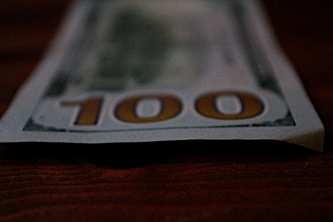 a close up of a hundred dollar bill