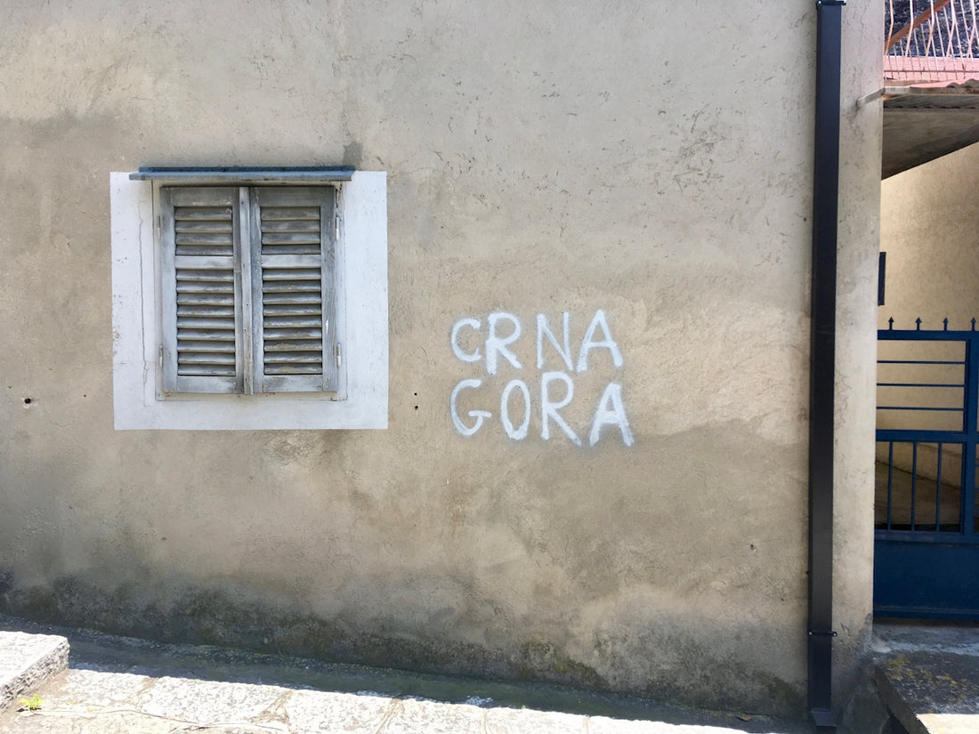 a wall with a sign on it