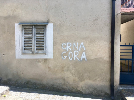 a wall with a sign on it