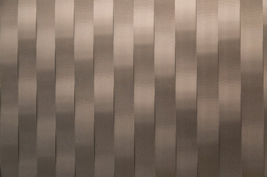 a close up of a wall made of metal strips
