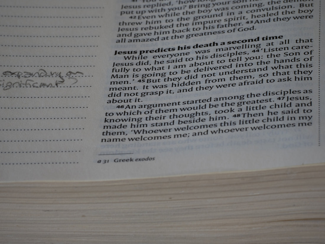 A close up of a book with writing on it