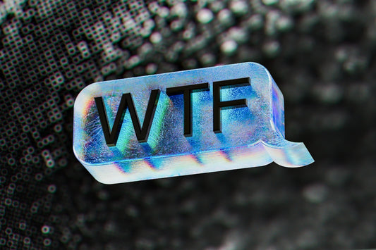 A close up of a text bubble with the word wft on it