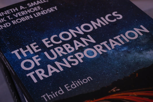 A book on the cover of the economic of urban transportation