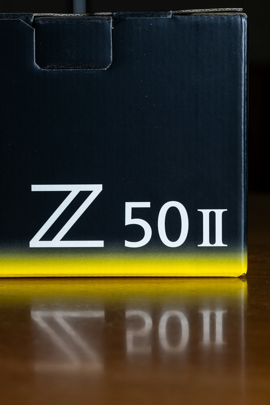 A black box with a yellow strip on top of it