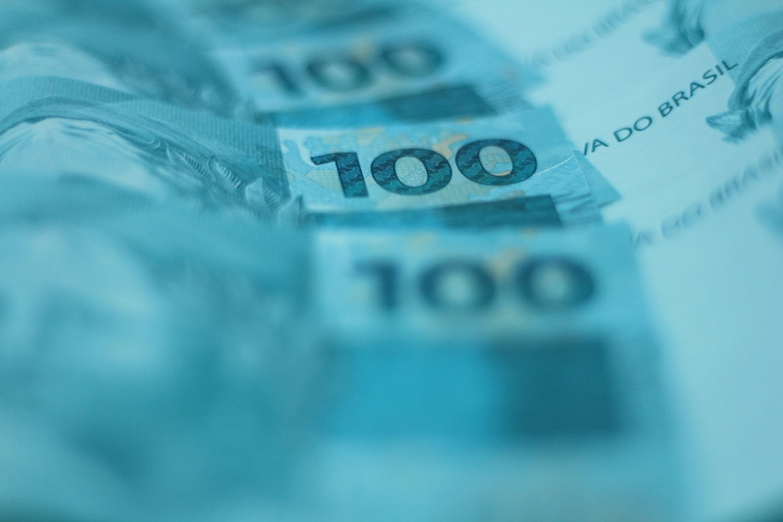 A bunch of money sitting on top of a table