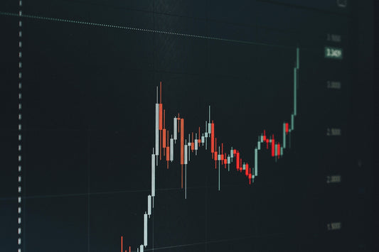 Stock market chart showing upward trend.