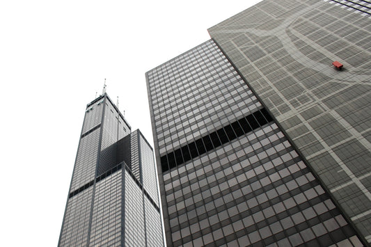 Tall skyscrapers reach high into the sky.